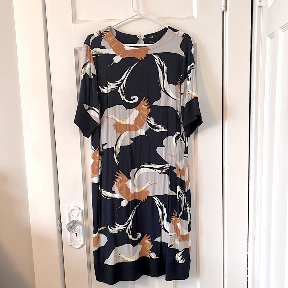 H&M Pretty navy dress with bird print. Midi length Sz 12